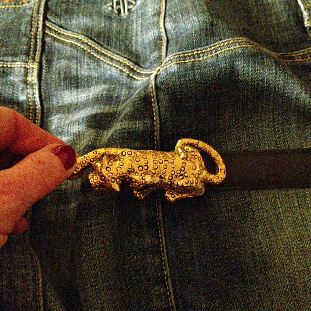 Black belt with gold metal leapord buckle